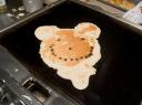 The last of the batter is used to make a giant Mickey Mouse pancake